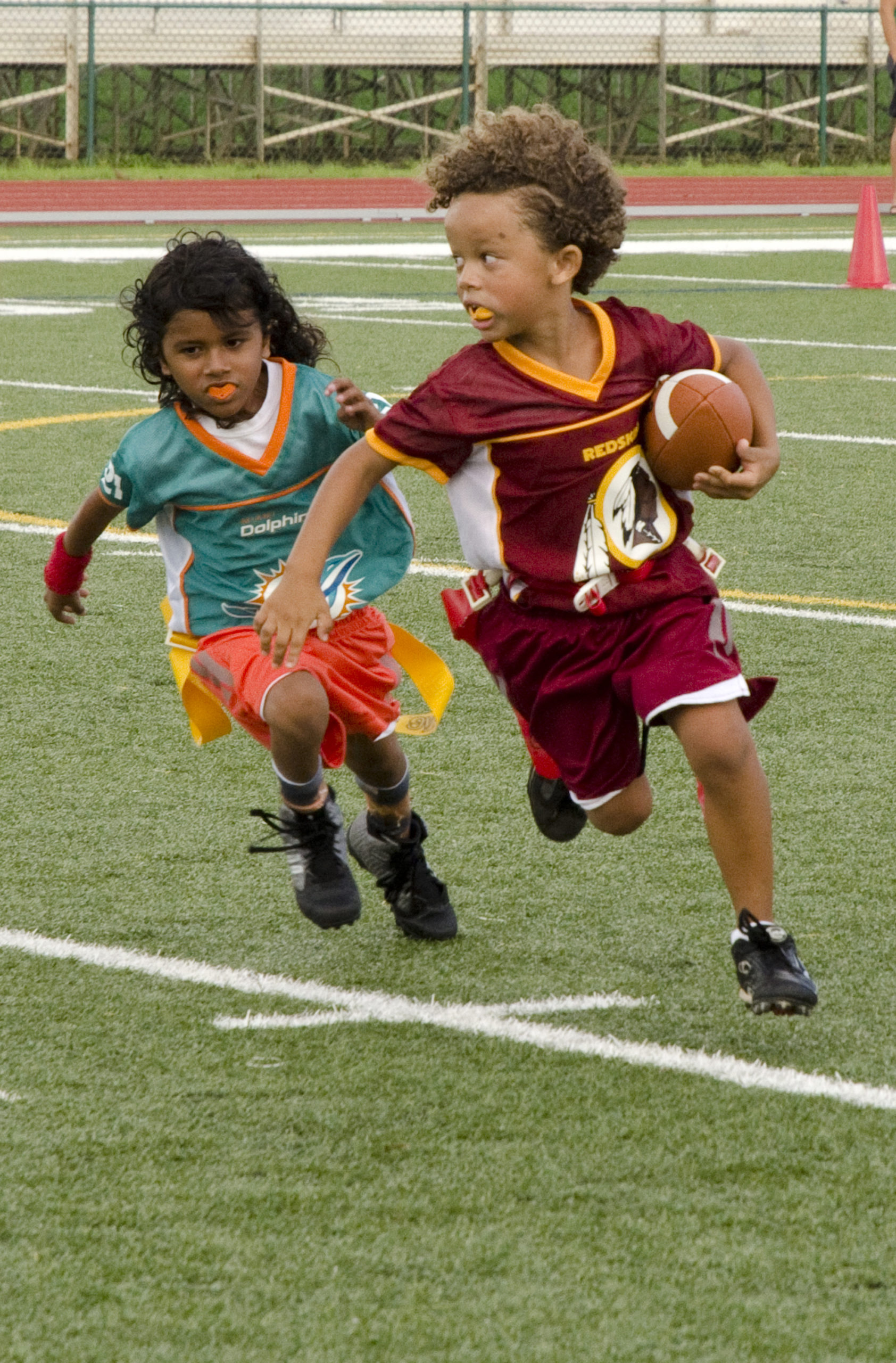 little kids playing flag football