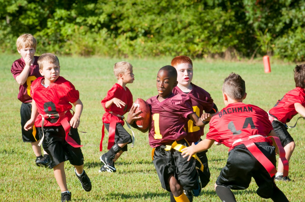 little kids playing flag football